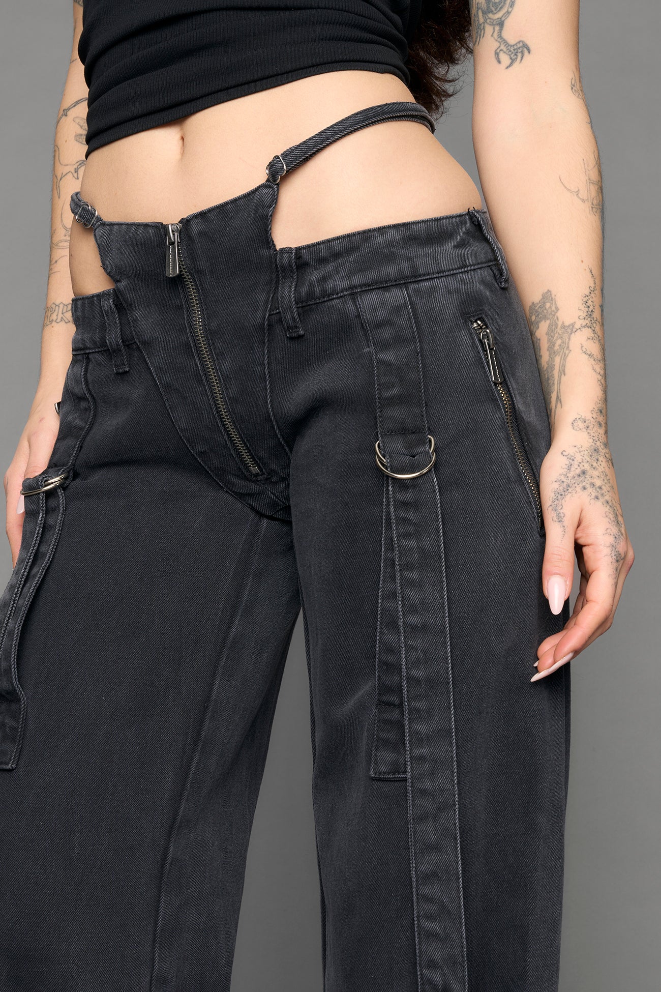 Hip cut-out detailing with adjustable strap accent