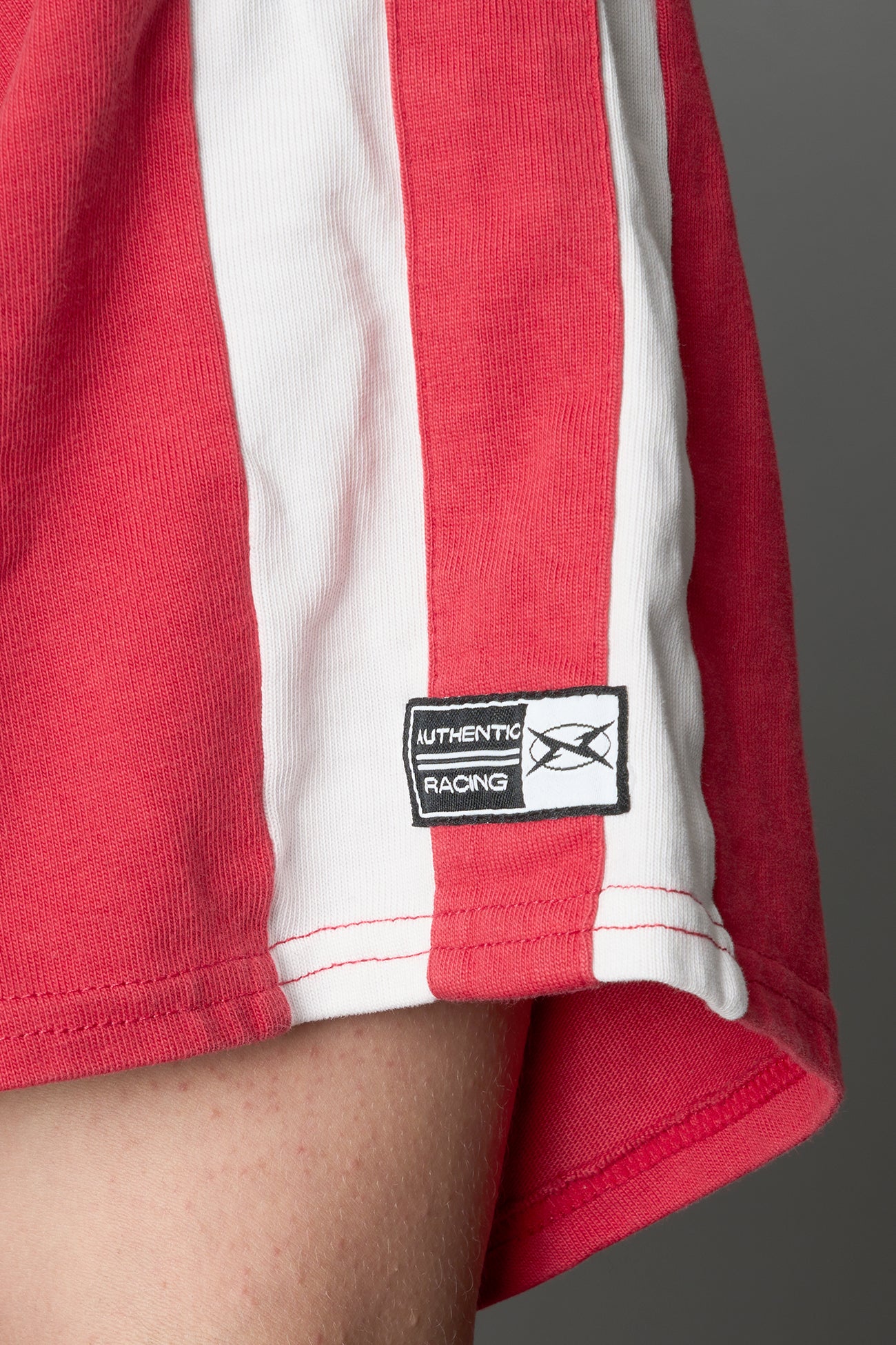 stripe panelling and woven athletic logo