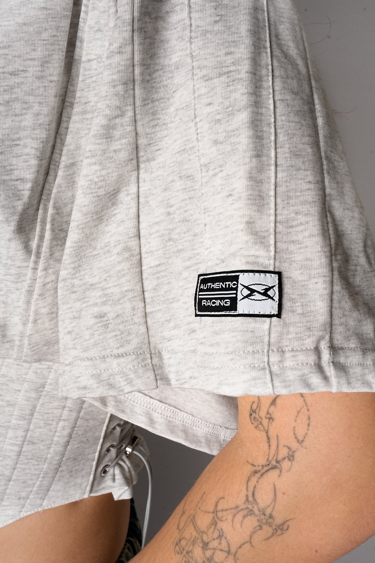 stripe panelling and woven athletic logo