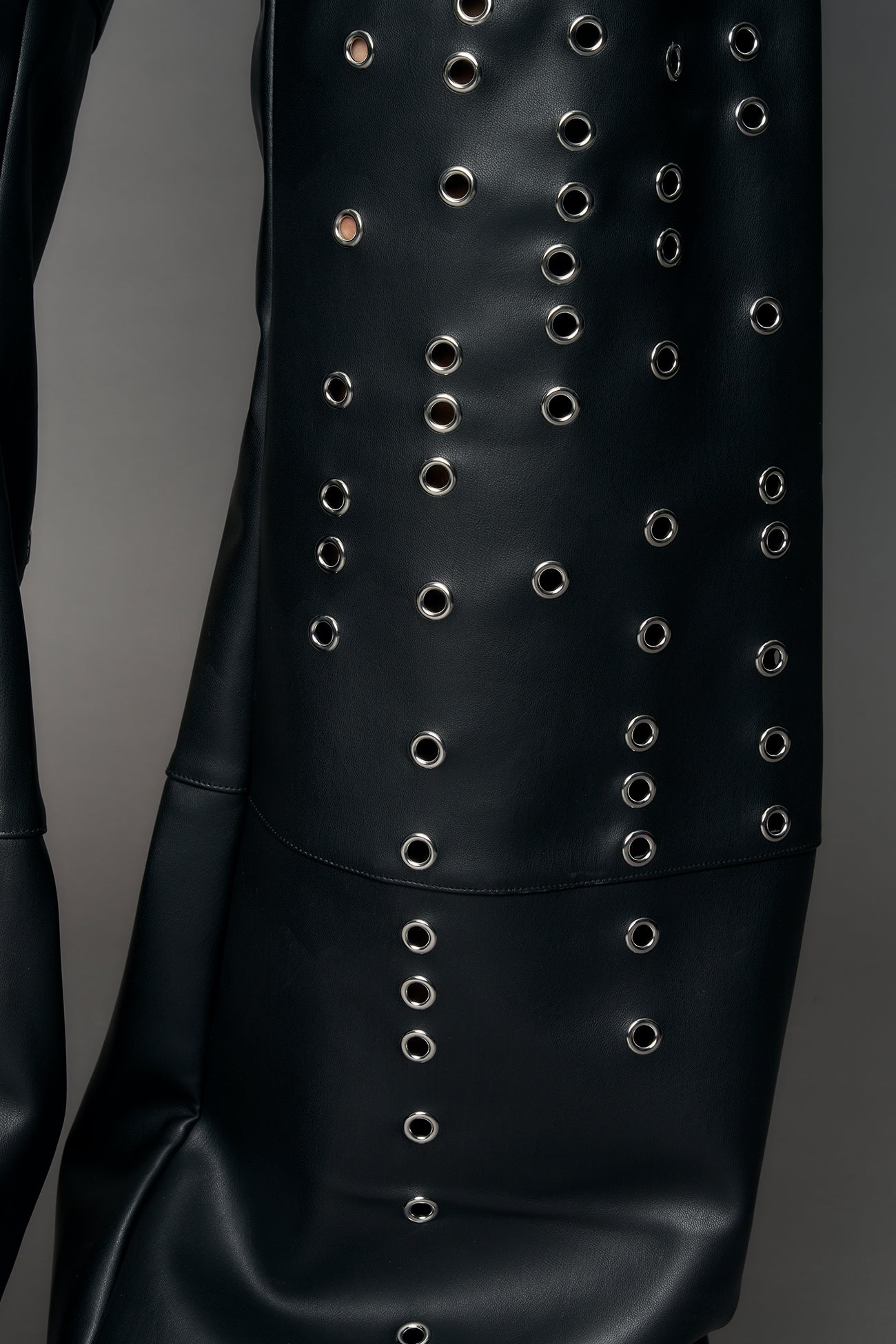 silver metal eyelets throughout