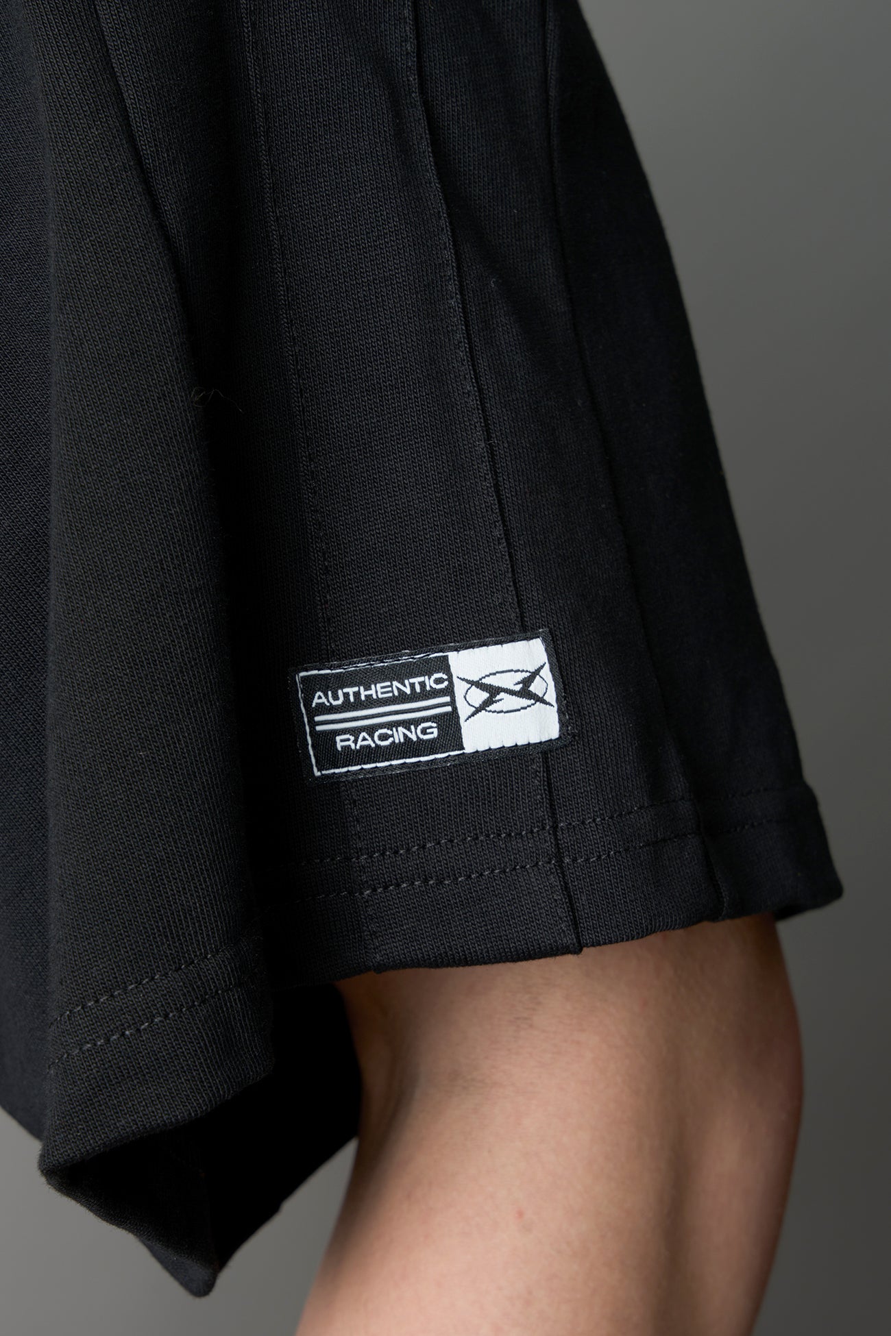 stripe panelling and woven athletic logo
